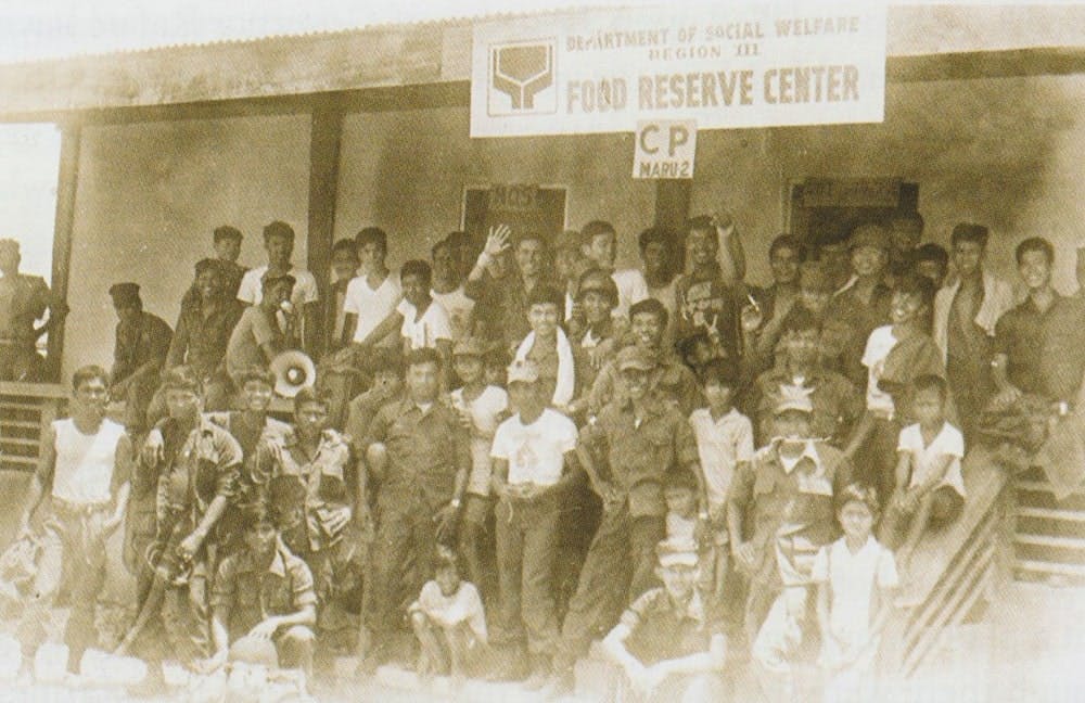 The Marines together with social workers and children at the Department of Social Welfare Region XII