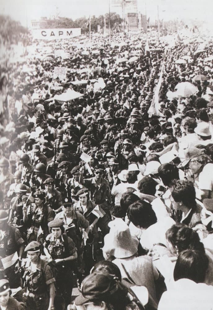 Displaying PH Security Forces marches at EDSA for crowd management mission but later on joined the masses during the People Power