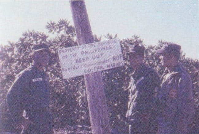 PH Navy and LTJr Grade Domingo Tucay with fellow Marine Officer during the landing on occupation of Pag-Asa Island, Kalayaan Island Group