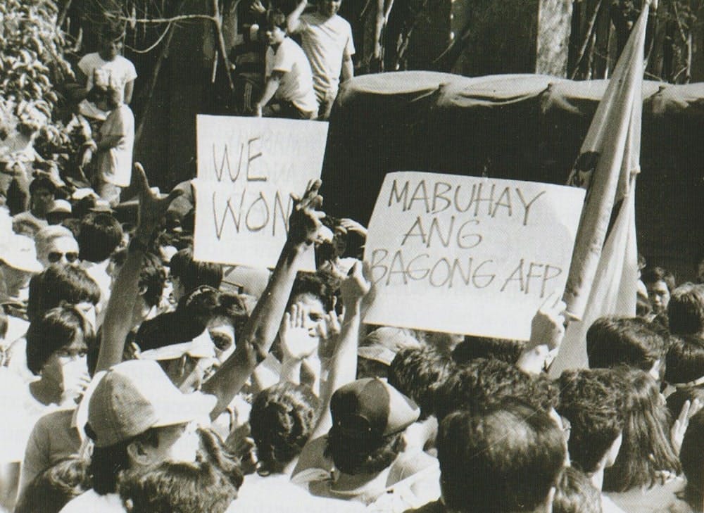 People celebrated upon hearing news that President Marcos left the country