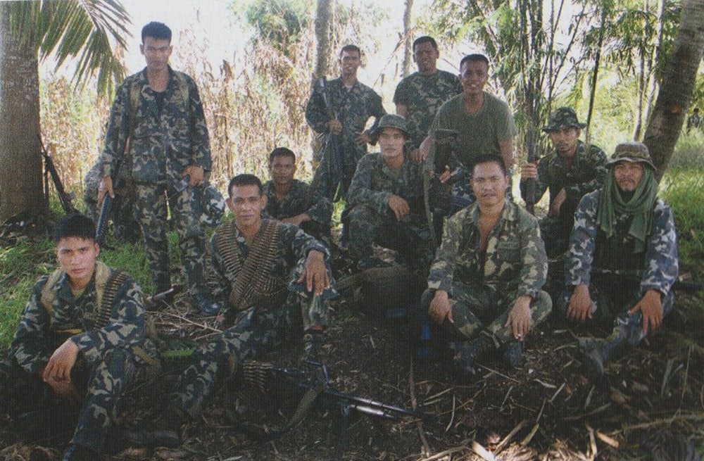 Marines take a photo after pursuit operations