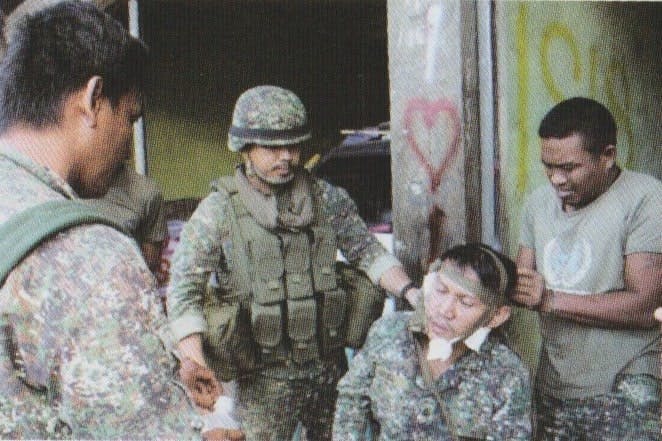 Marine corpsmen give first aid to the wounded warriors during the Marawi Siege